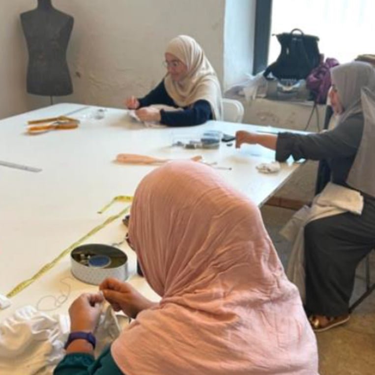 dones teixint bosses de roba de teixint esperances